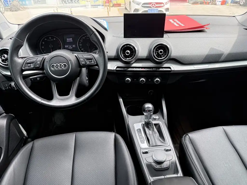 Audi Q2L 2021 — фото 11