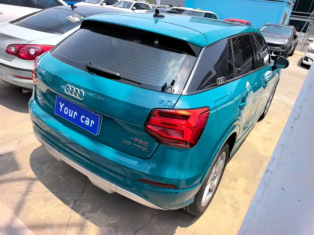 Audi Q2L 2019 — фото 6