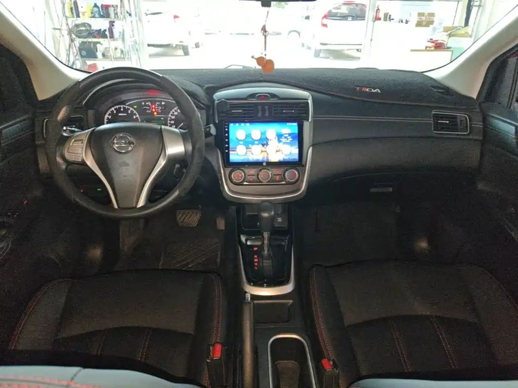 Nissan Tiida 2017 — фото 10