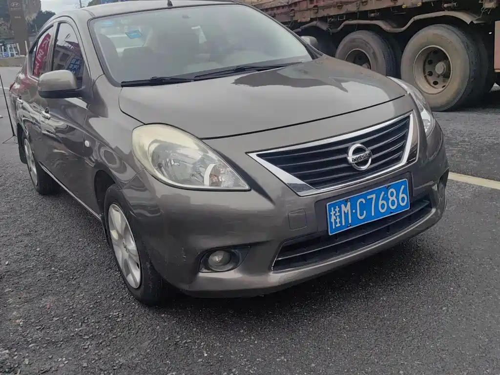 Nissan Sunny 2011 — фото 2
