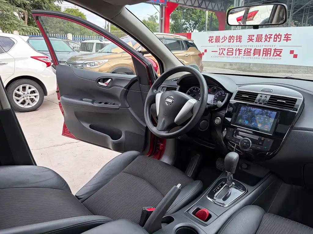 Nissan Tiida 2016 — фото 10