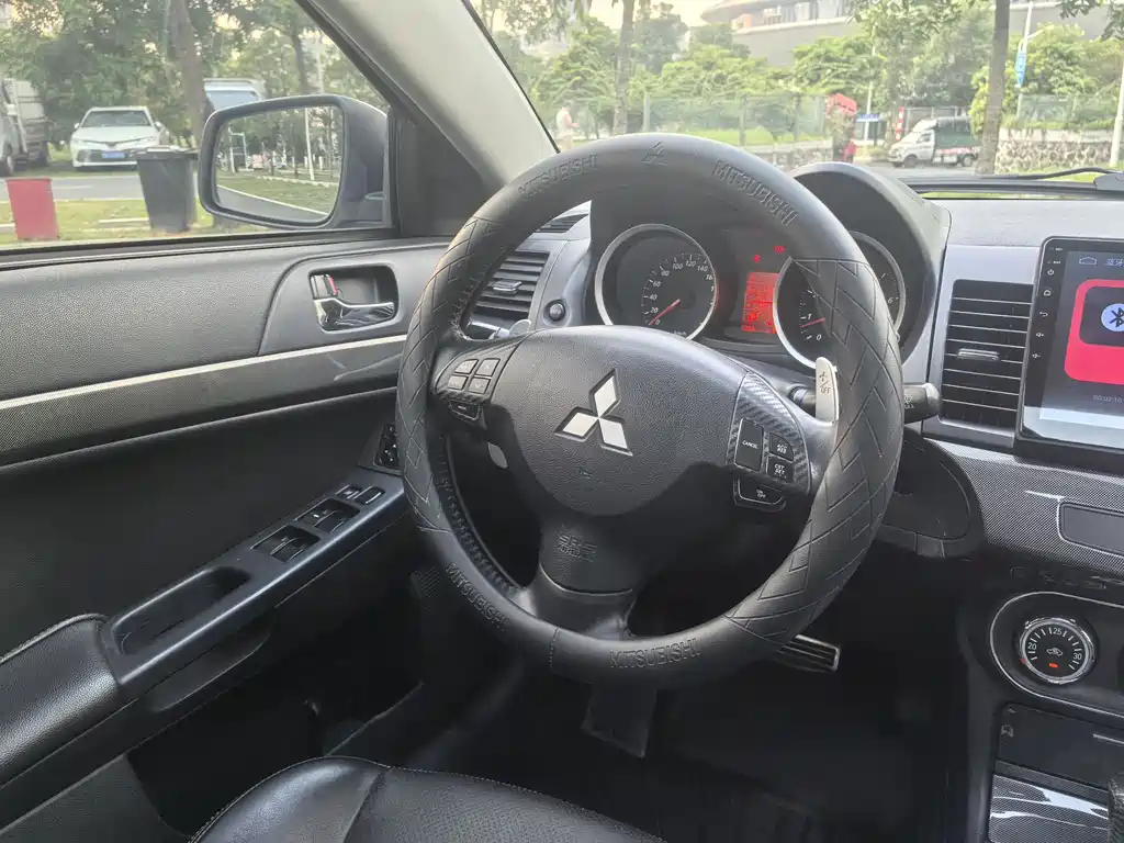 Mitsubishi Lancer EX 2012 — фото 12