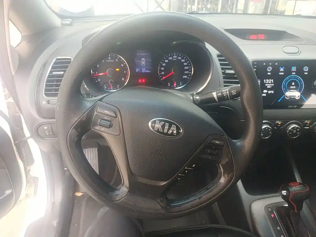 Kia K3 2014 — фото 11