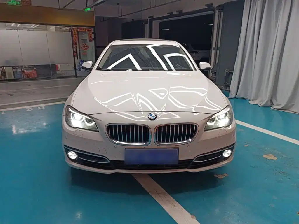 BMW 5 Series 2014 — фото 19