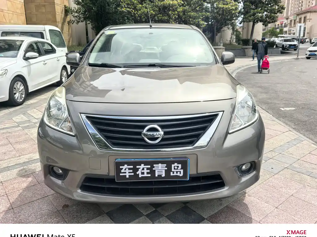 Nissan Sunny 2011 — фото 2