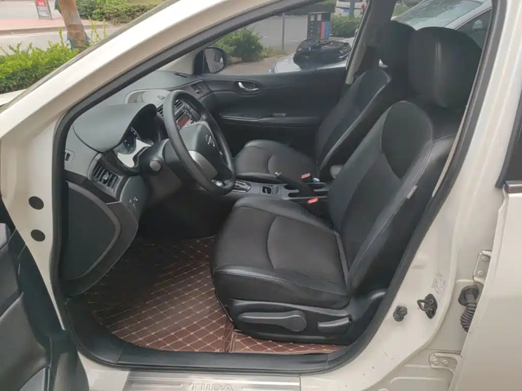 Nissan Tiida 2015 — фото 15