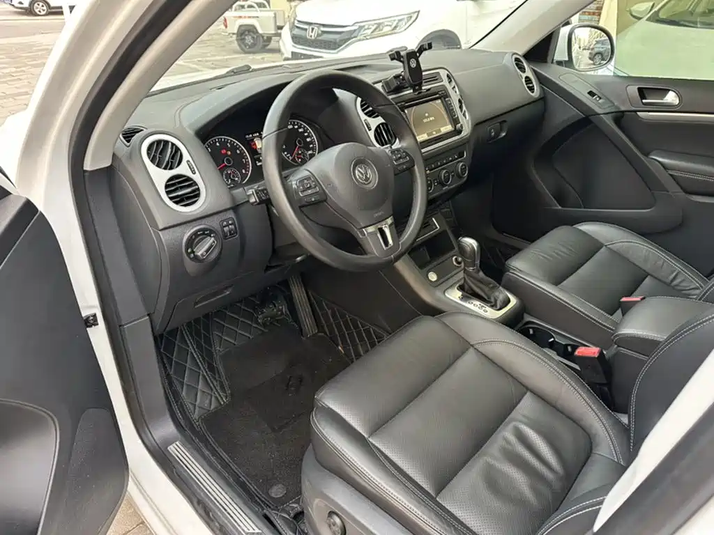 Volkswagen Tiguan 2016 — фото 11
