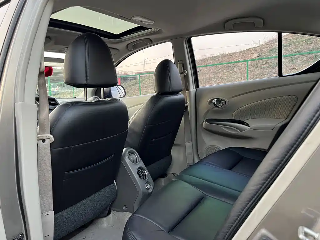 Nissan Sunny 2014 — фото 11