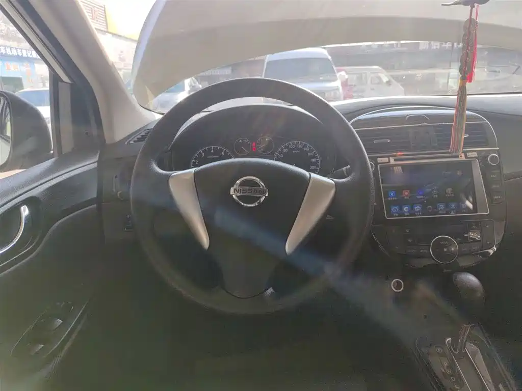 Nissan Tiida 2015 — фото 11