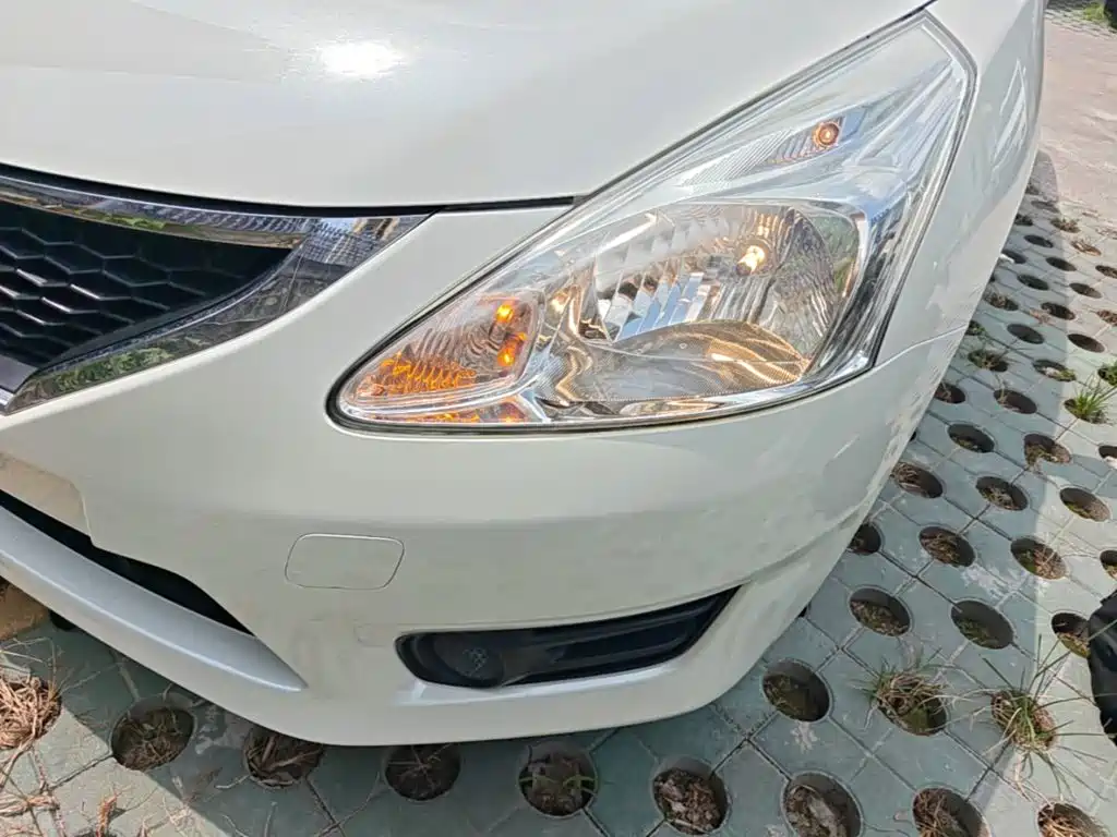 Nissan Tiida 2016 — фото 24