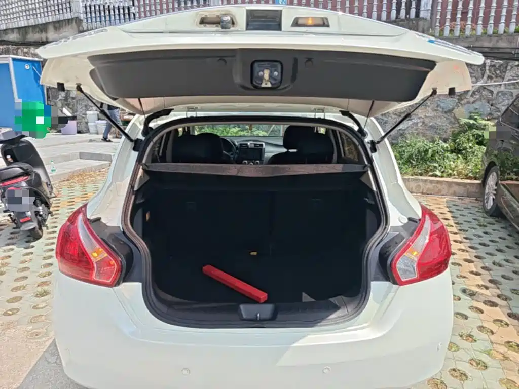 Nissan Tiida 2016 — фото 19