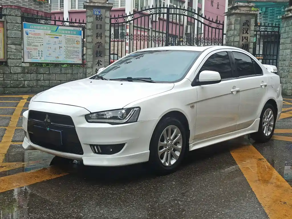 Mitsubishi Lancer EX 2013 — фото 1