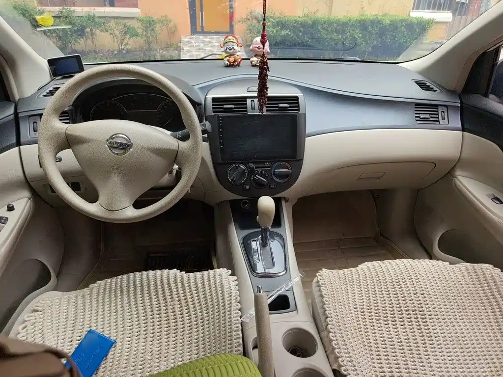 Nissan Tiida 2015 — фото 6
