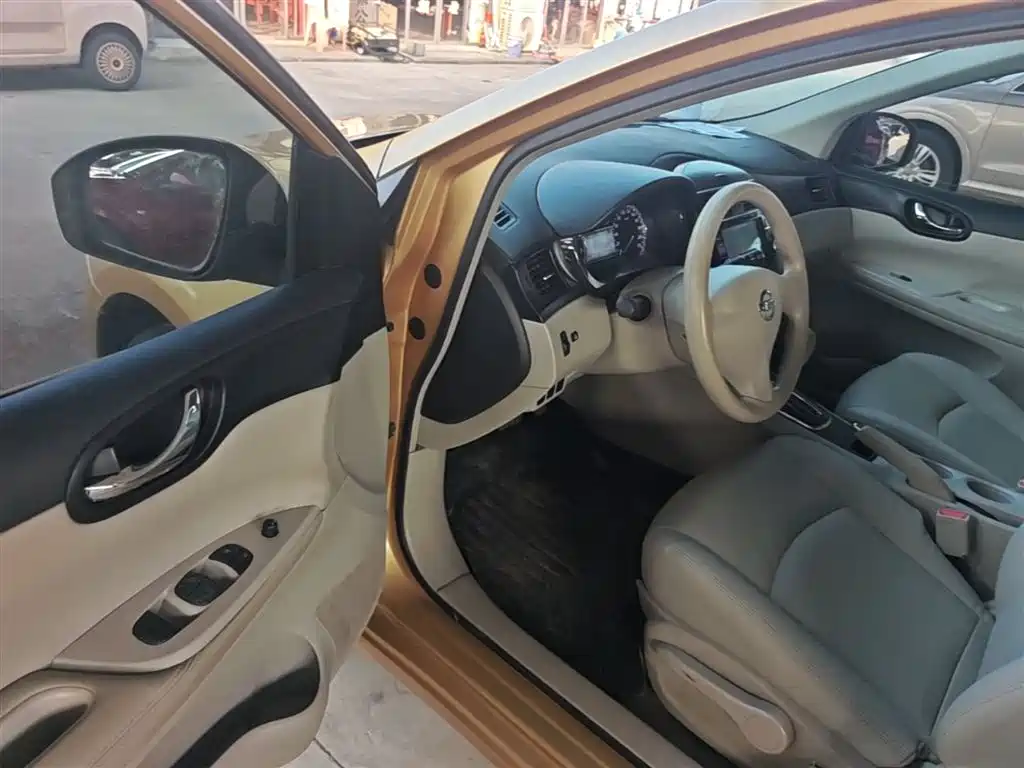Nissan Tiida 2016 — фото 16