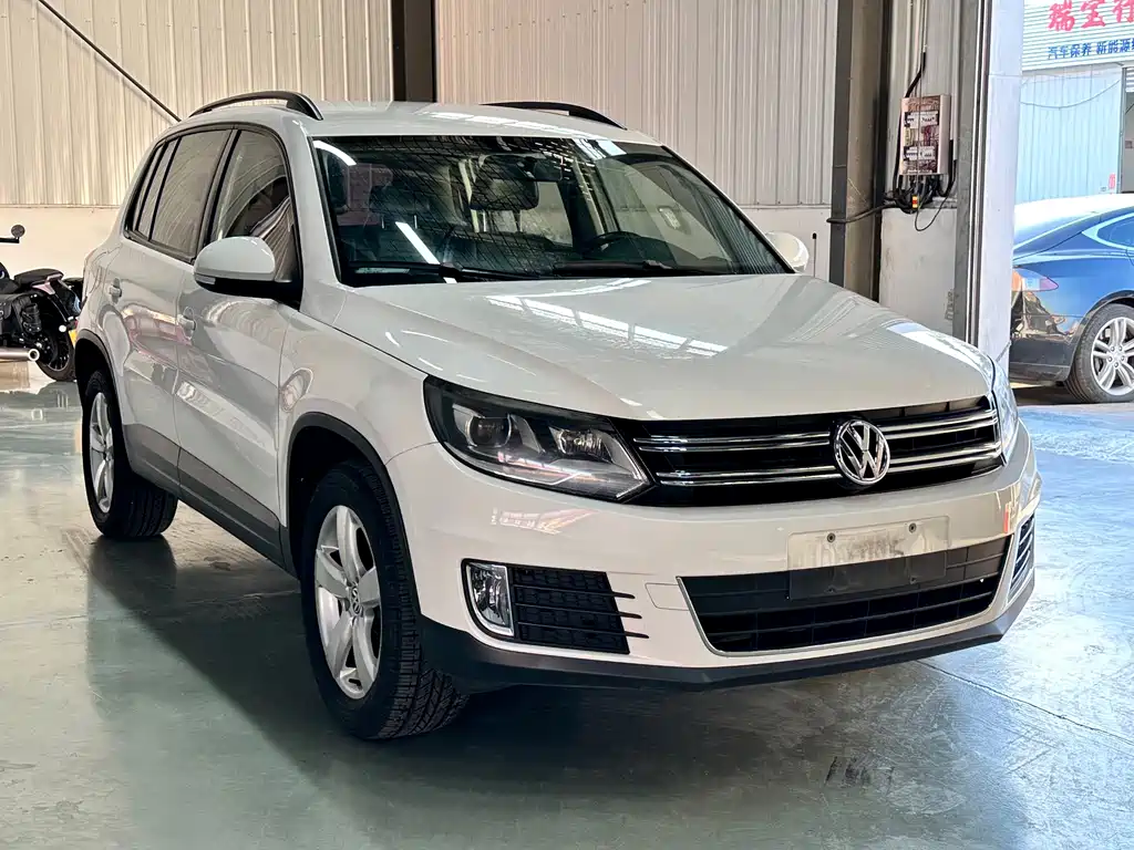 Volkswagen Tiguan 2013 — фото 3