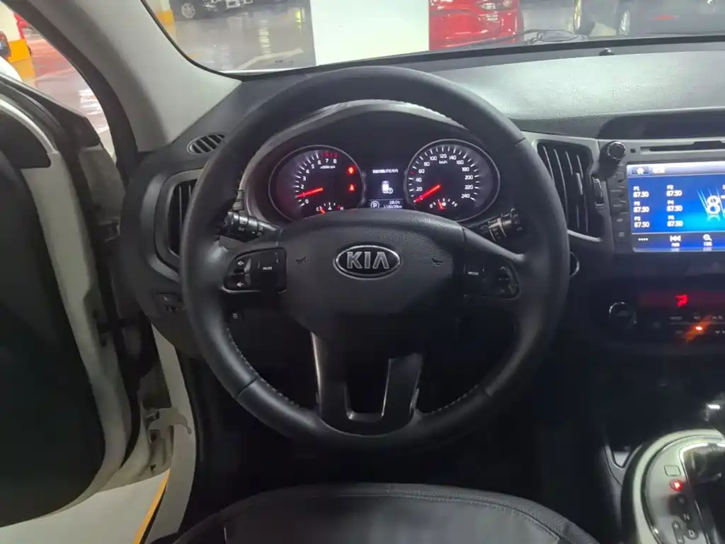 Kia Sportage 2014 — фото 11