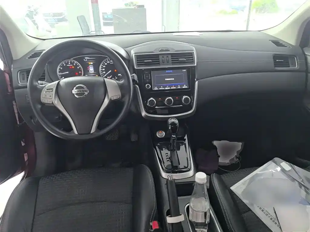 Nissan Tiida 2018 — фото 10