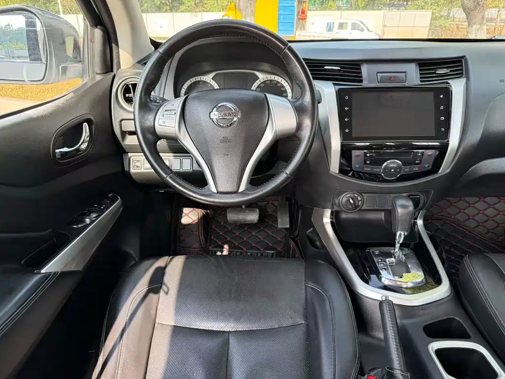 Nissan Navara 2022 — фото 16