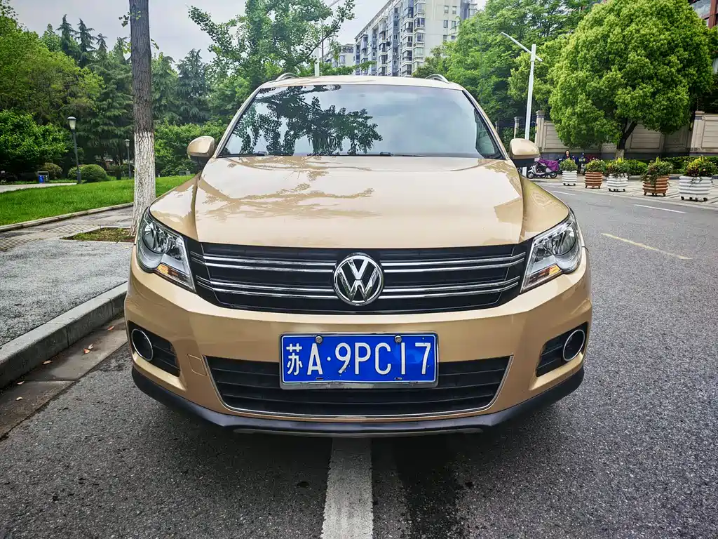 Volkswagen Tiguan 2013 — фото 2