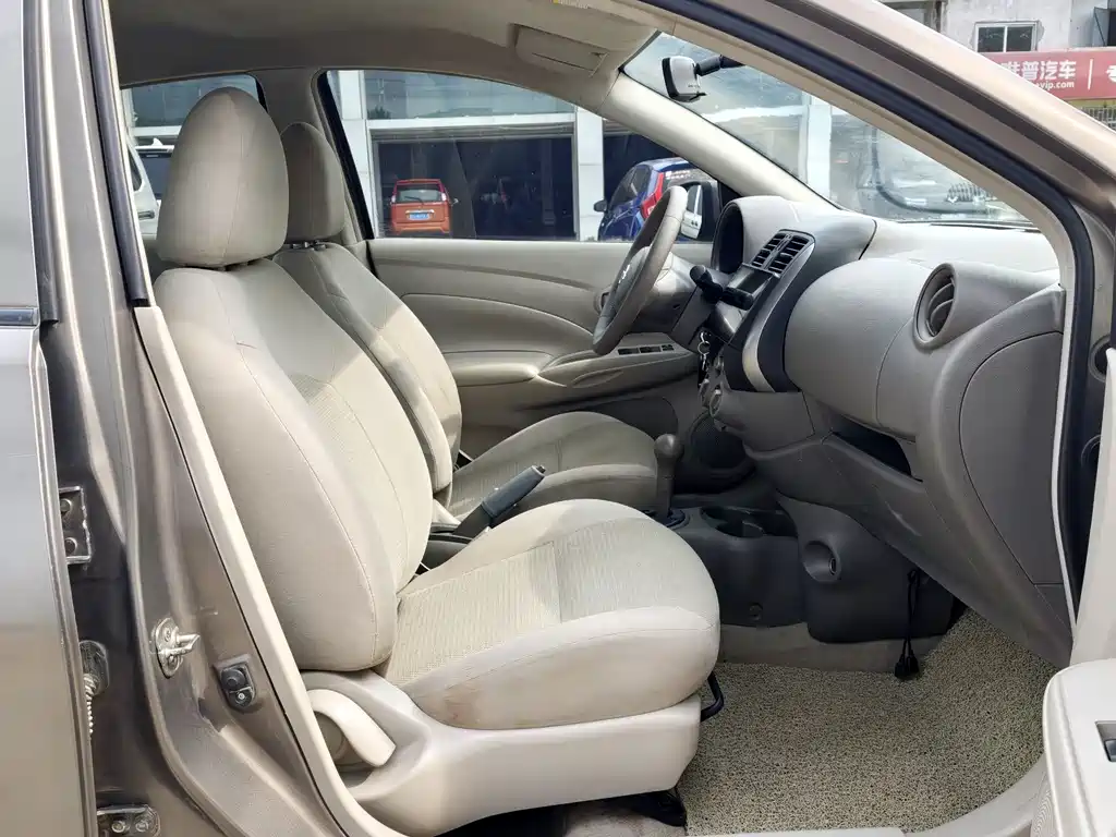 Nissan Sunny 2012 — фото 10