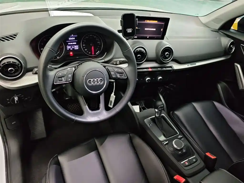 Audi Q2L 2021 — фото 10