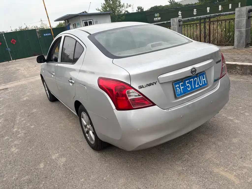 Nissan Sunny 2014 — фото 6