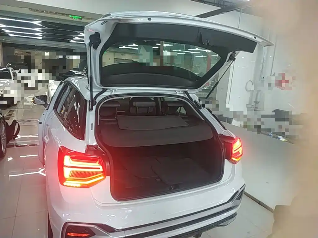 Audi Q2L 2023 — фото 19