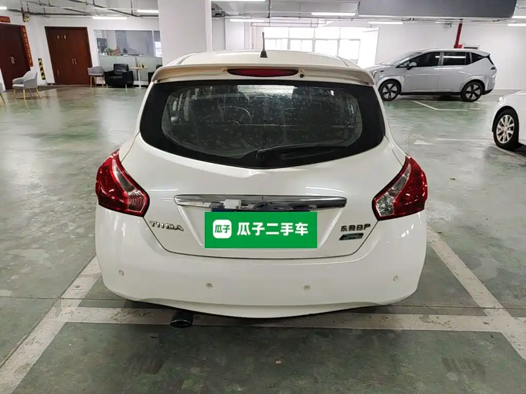 Nissan Tiida 2015 — фото 6