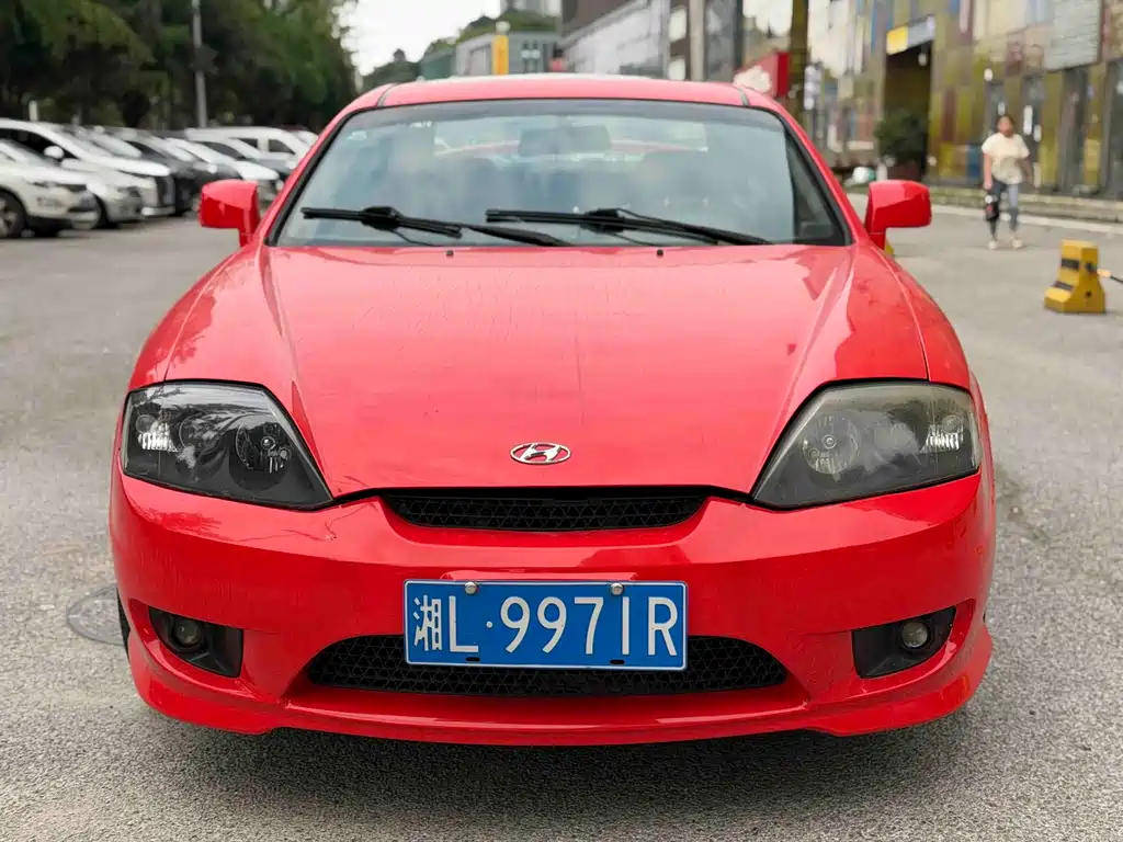 Hyundai Coupe 2004 — фото 2