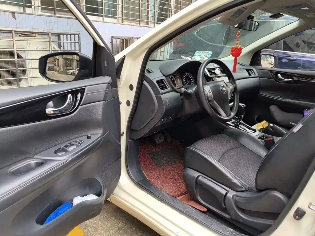 Nissan Tiida 2017 — фото 14