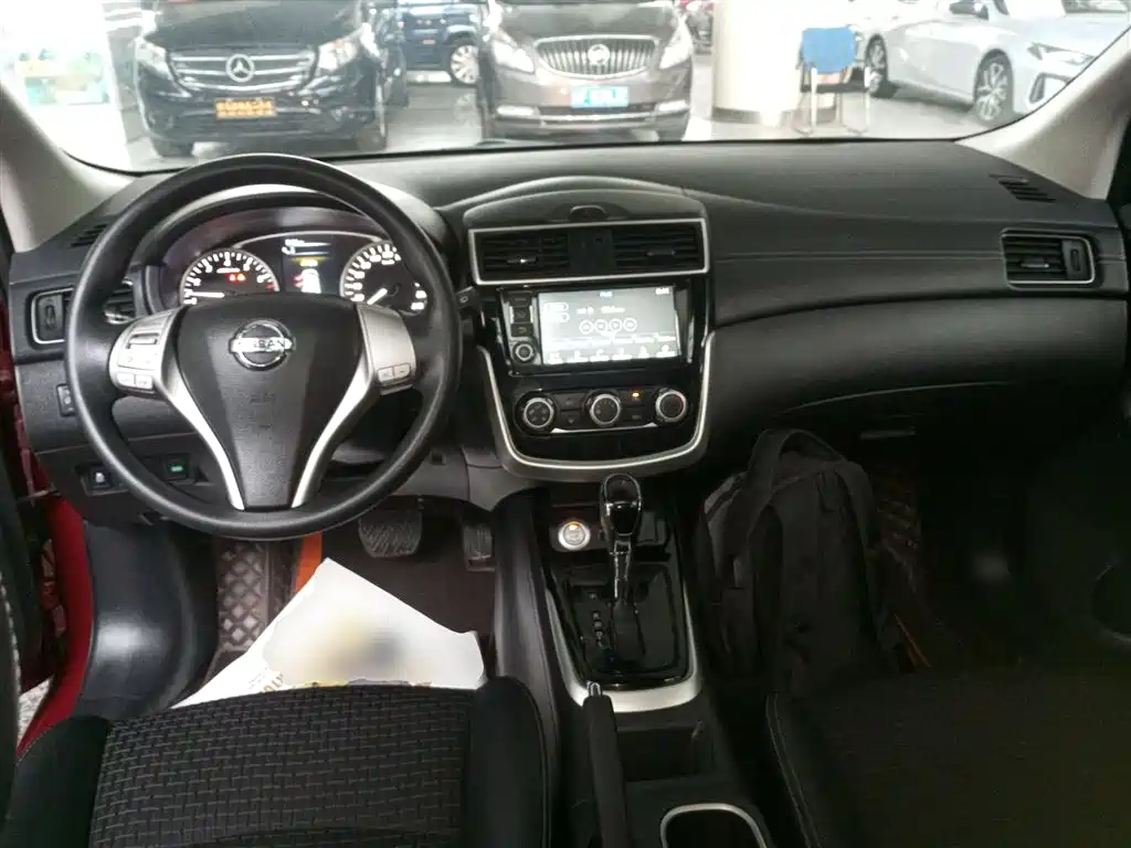 Nissan Tiida 2018 — фото 10
