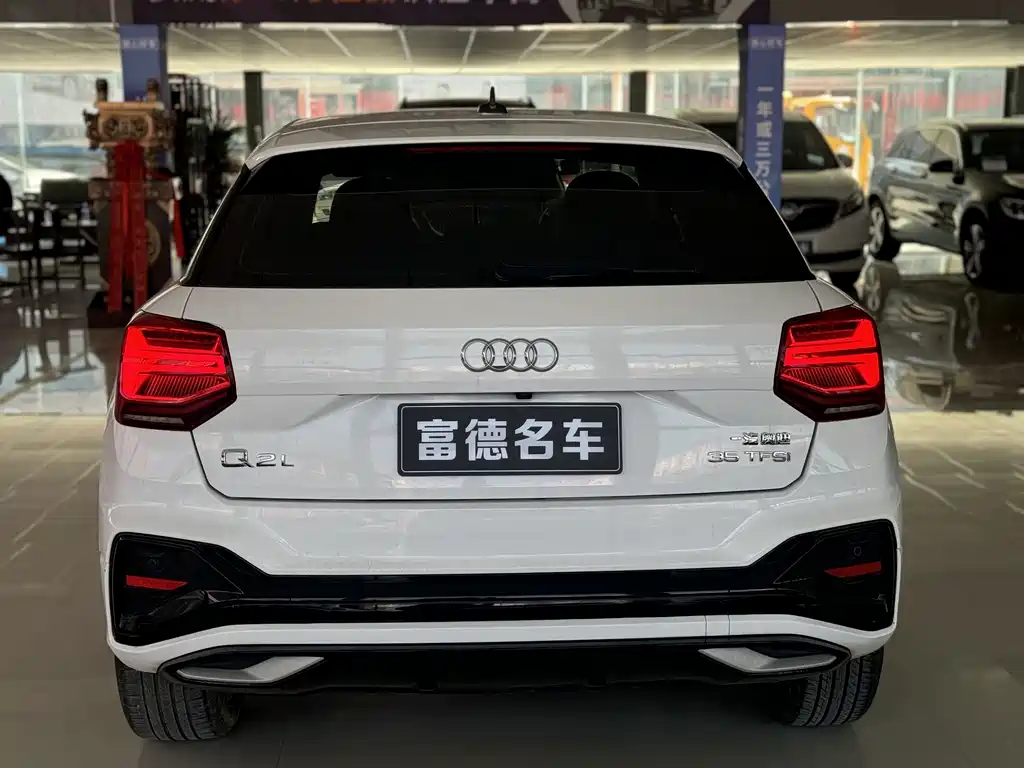 Audi Q2L 2022 — фото 14