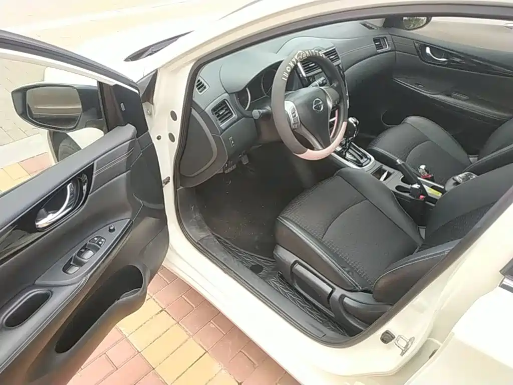 Nissan Tiida 2019 — фото 16