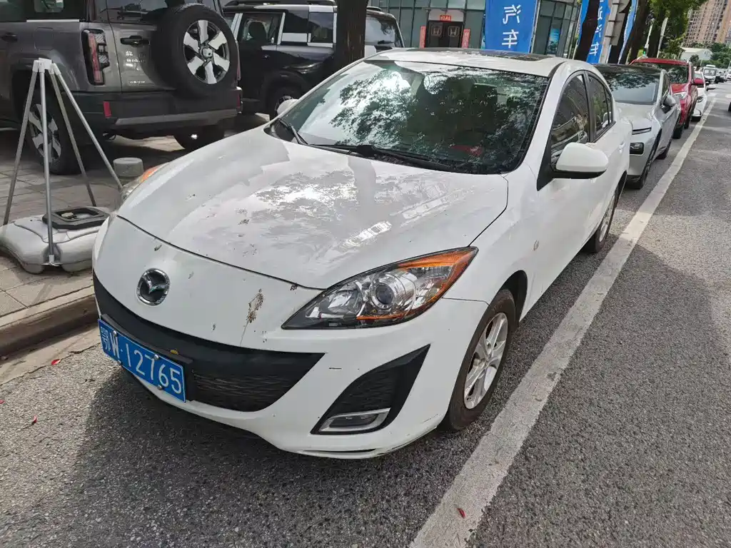 Mazda 3 Xingcheng 2013 — фото 1
