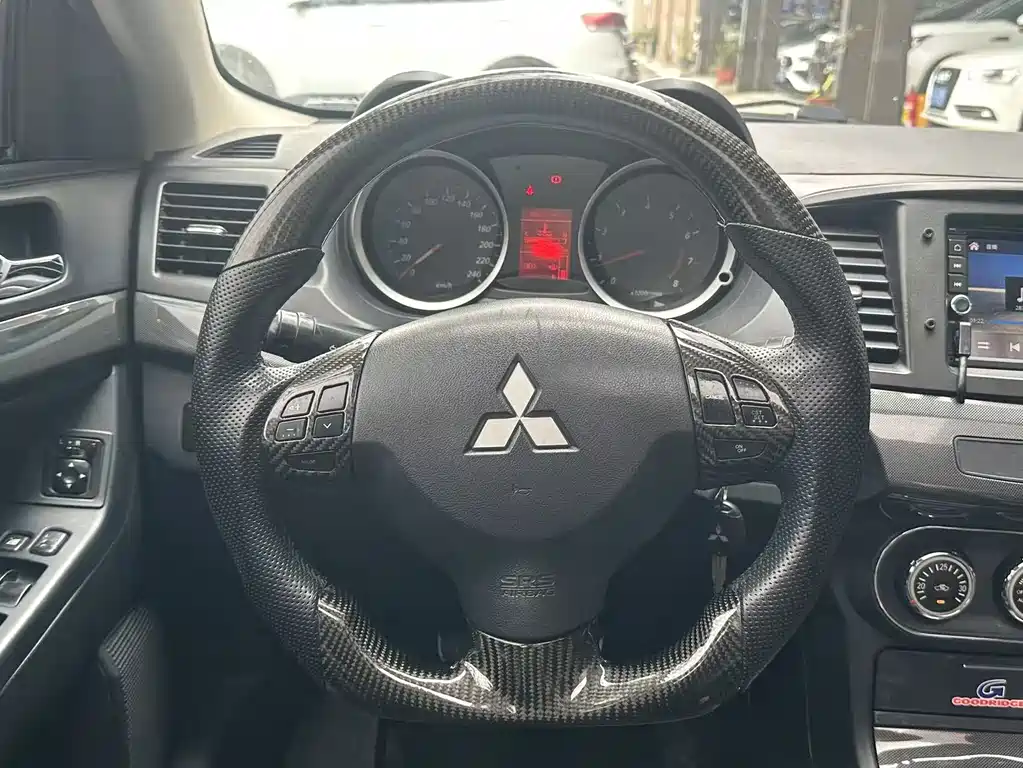 Mitsubishi Lancer EX 2011 — фото 11