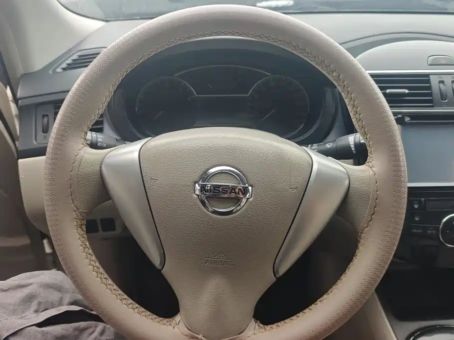 Nissan Tiida 2014 — фото 15