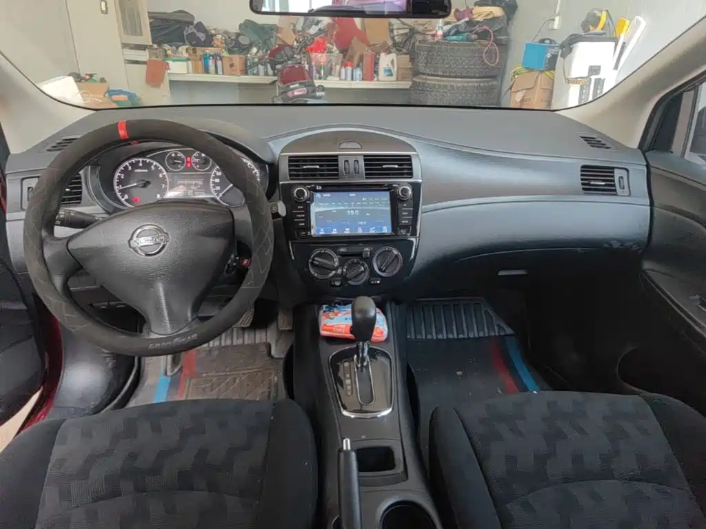 Nissan Tiida 2015 — фото 10