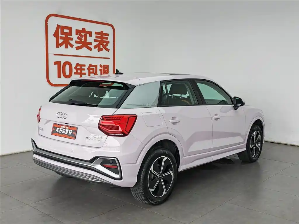 Audi Q2L e-tron 2022 — фото 2