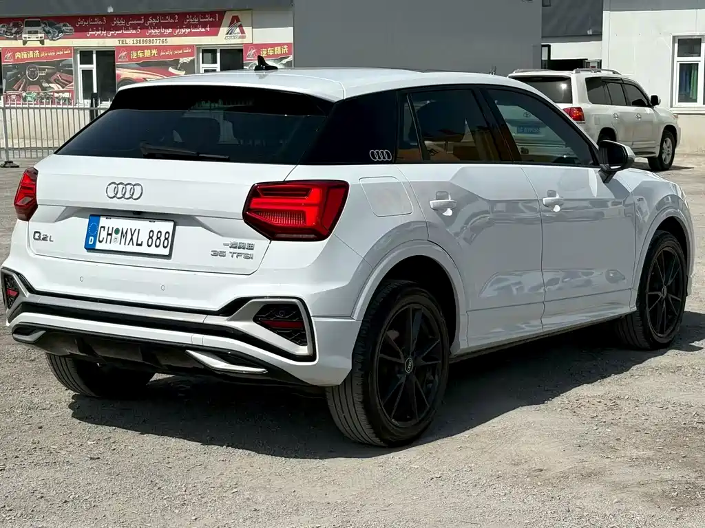 Audi Q2L 2023 — фото 7