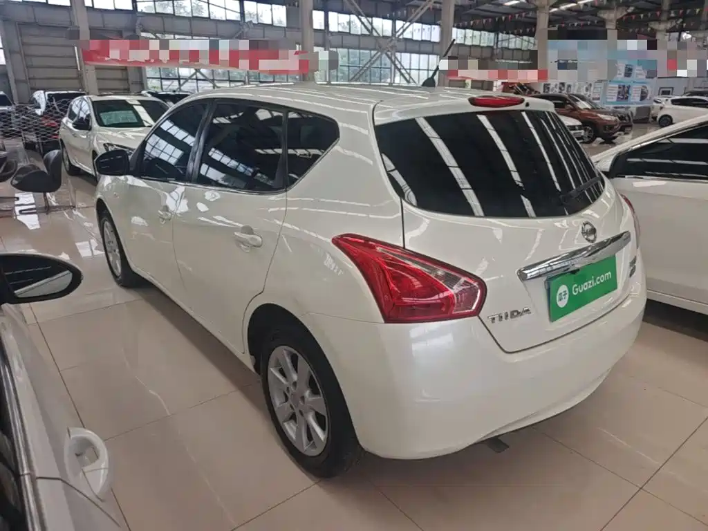 Nissan Tiida 2015 — фото 23