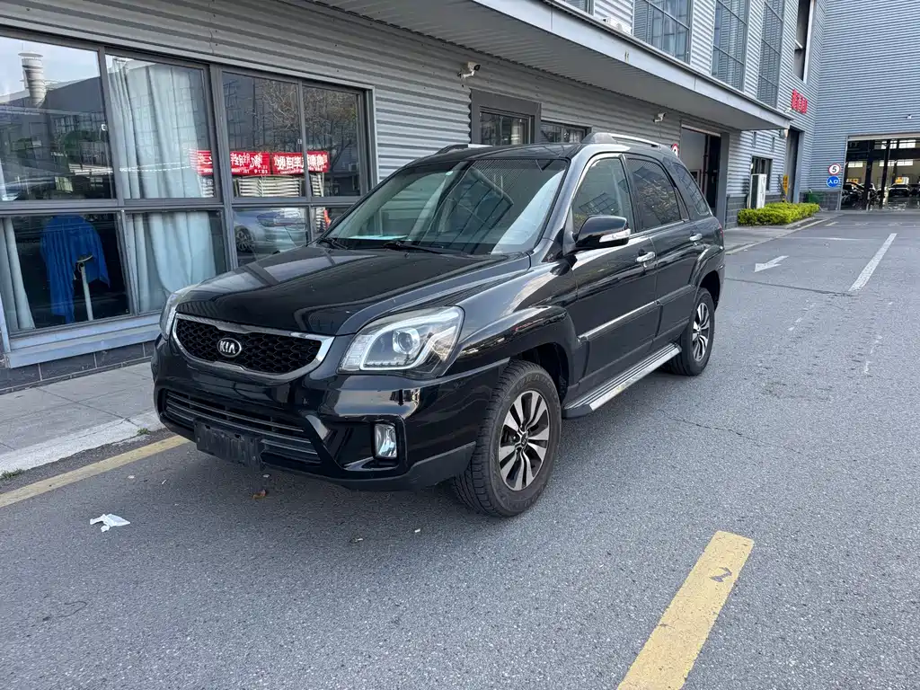 Kia Sportage 2013 — фото 1