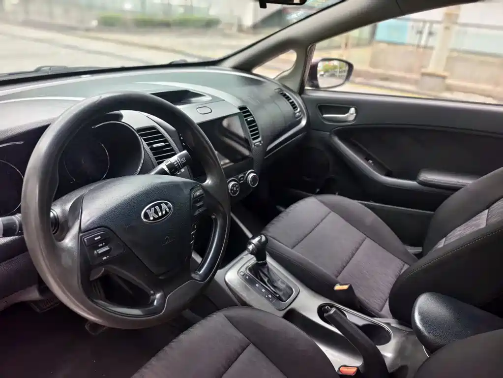 Kia K3 2014 — фото 11