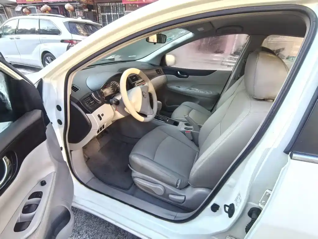 Nissan Tiida 2015 — фото 8