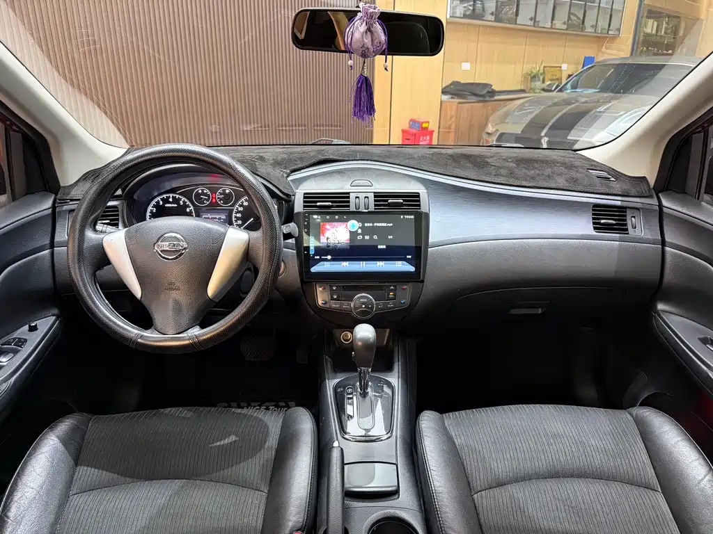 Nissan Tiida 2014 — фото 17