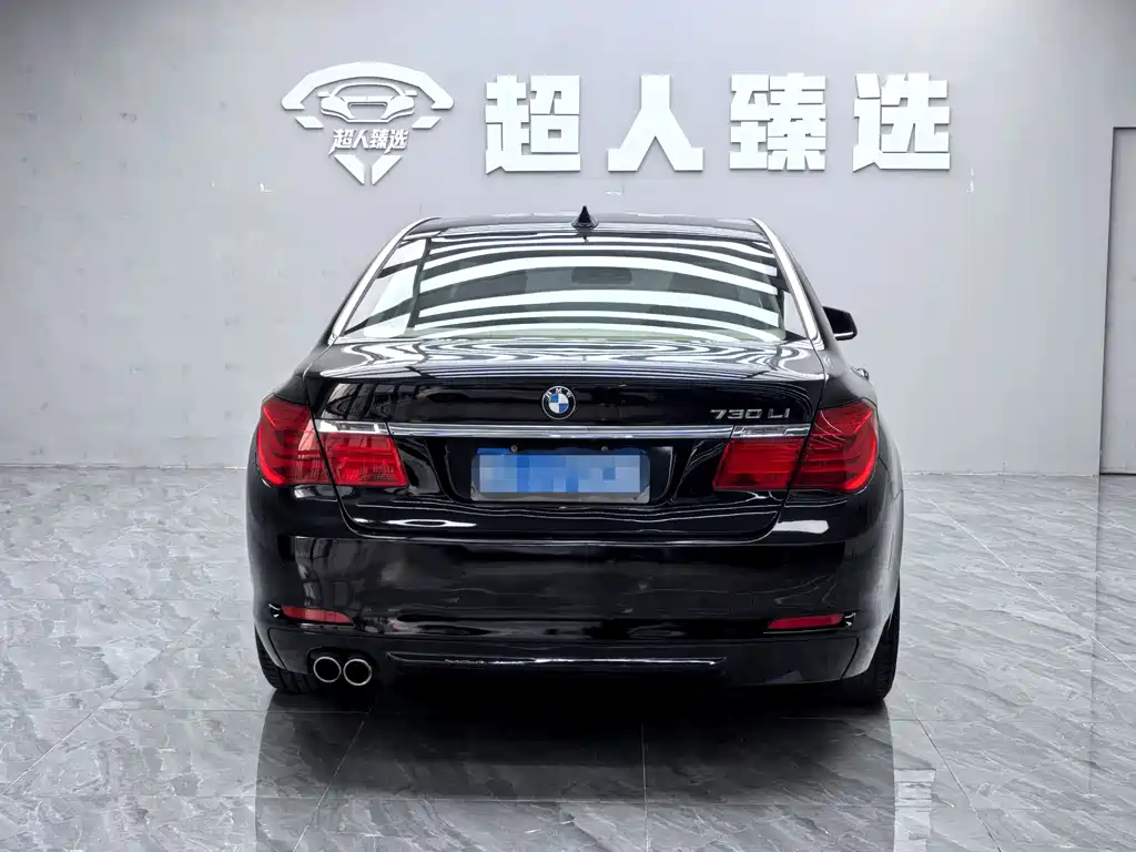 BMW 7 Series 2011 — фото 14