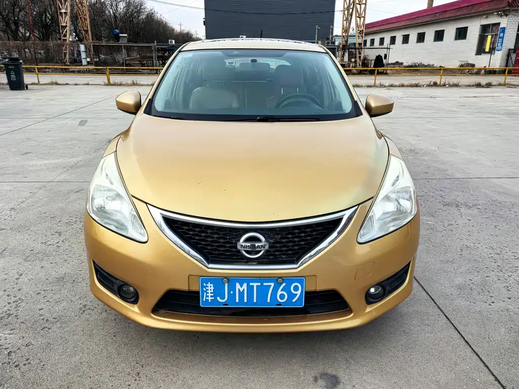Nissan Tiida 2015 — фото 2