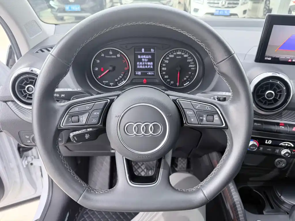 Audi Q2L 2022 — фото 11