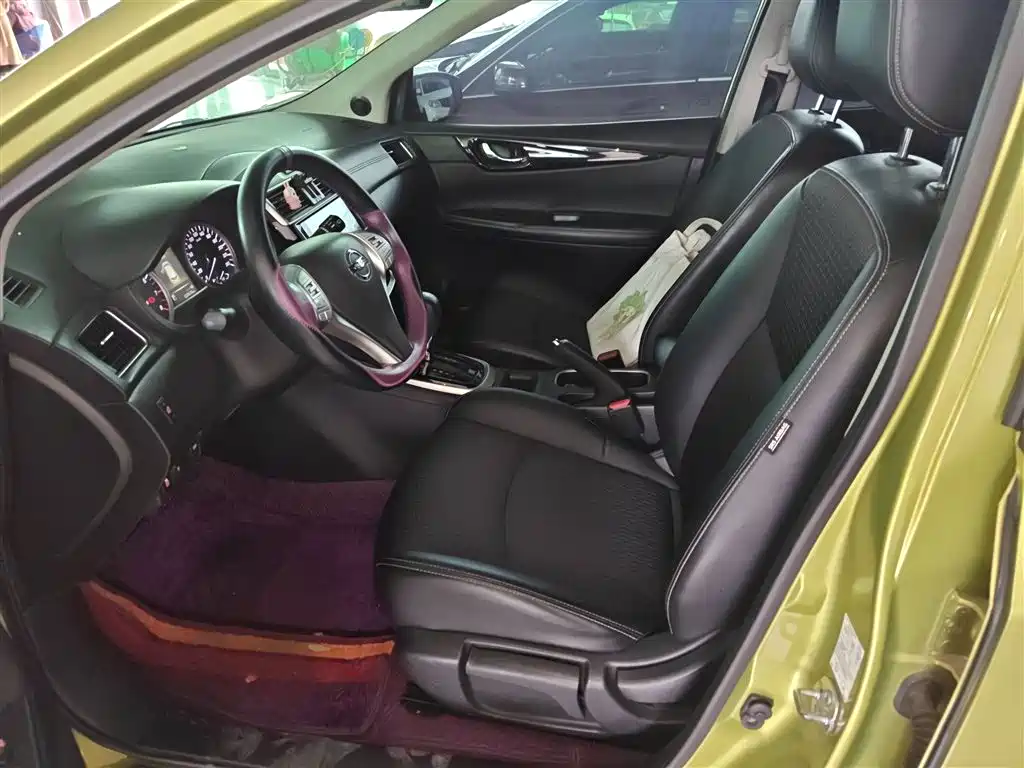 Nissan Tiida 2017 — фото 11