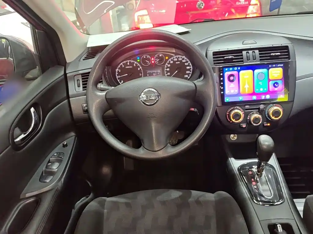 Nissan Tiida 2015 — фото 11