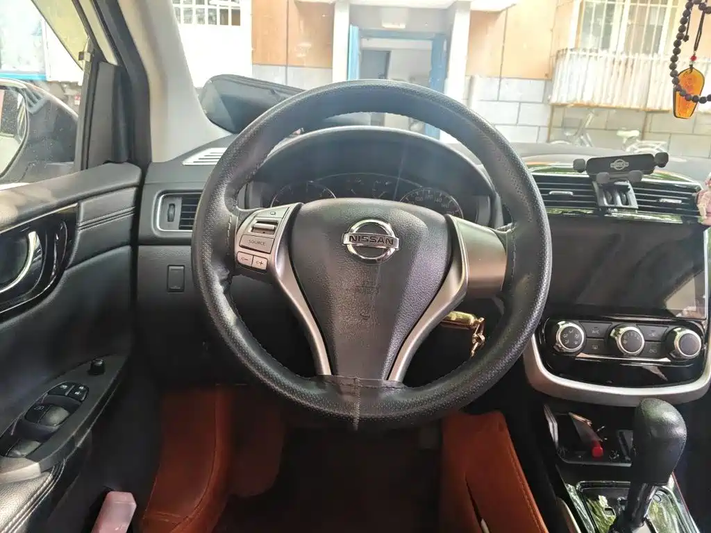 Nissan Tiida 2019 — фото 11